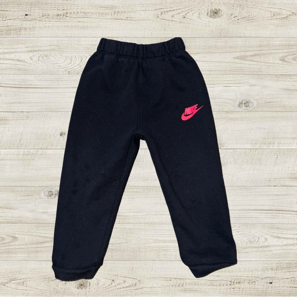 Nike Kids Black Joggers with Red Logo
